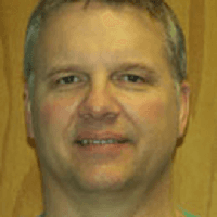 Gregory A. Mork