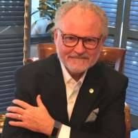 Jon R. Comola