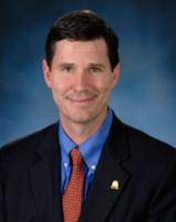 John A. Olson, Jr