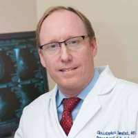 Christopher E. Comstock