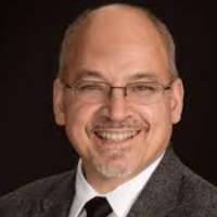 John C. Comisi