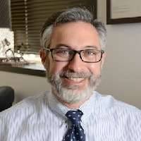 Adam M. Brenner